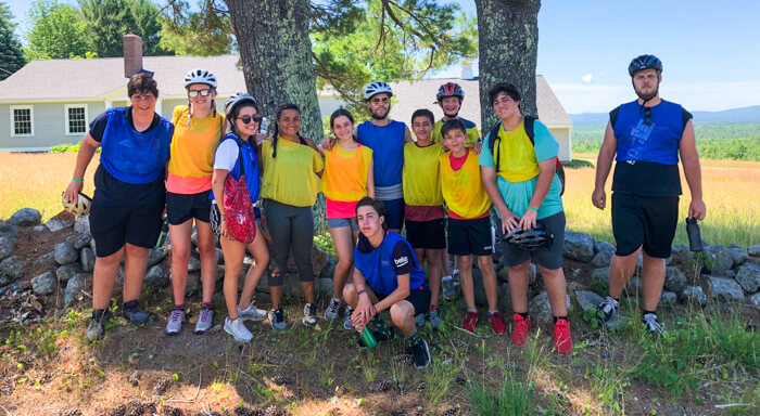 Group of campers preps for mountain biking