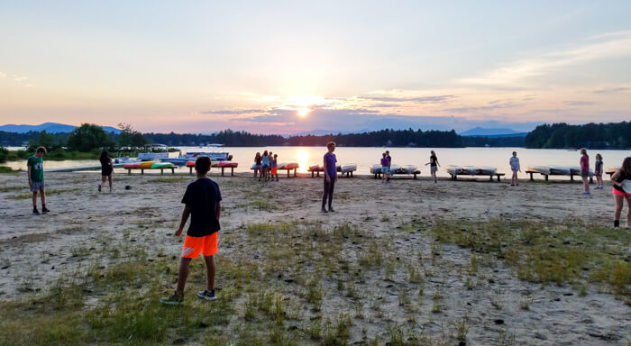 Sunset over summer camp waterfront