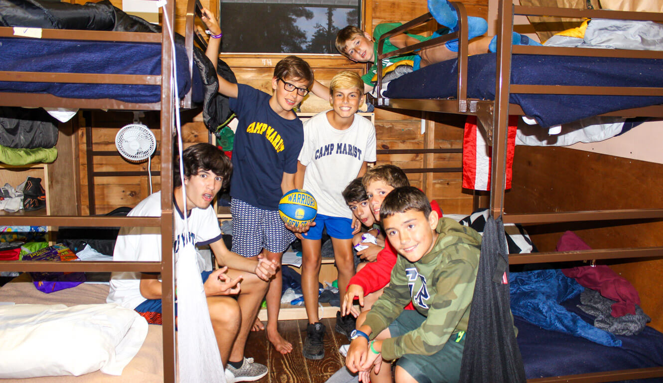 Group of boys in summer camp cabin